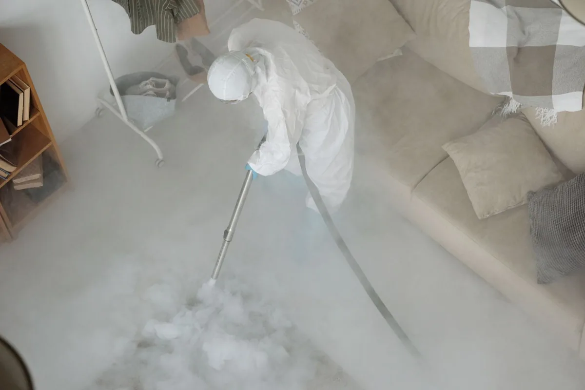Biohazard cleanup technician in protective equipment, West Haverstraw, NY